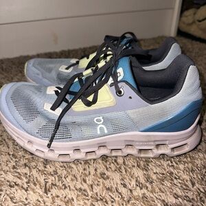 On Running Athletic Shoes in Blue and Gray